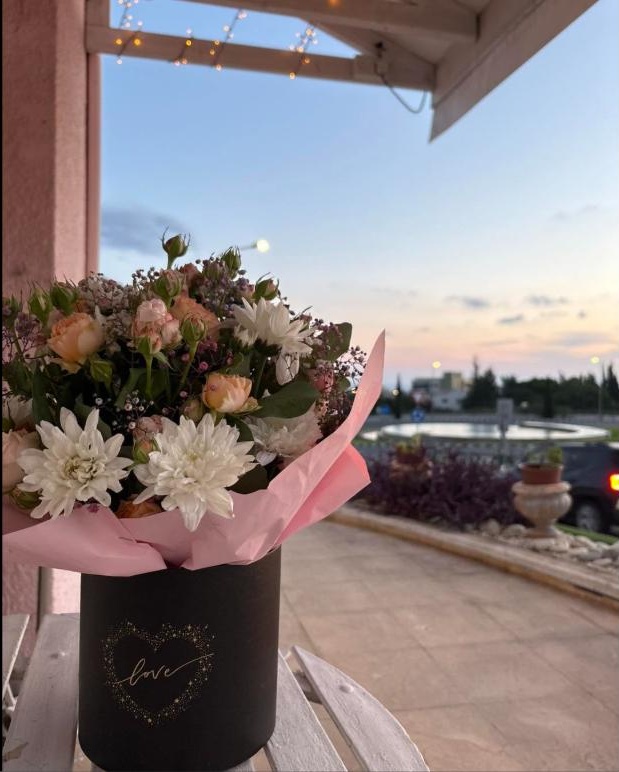 A real Jasmine’s Bloom & More delivery bouquet at golden hour in Paphos